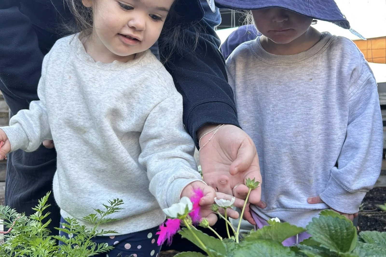 A child learning through play and exploration