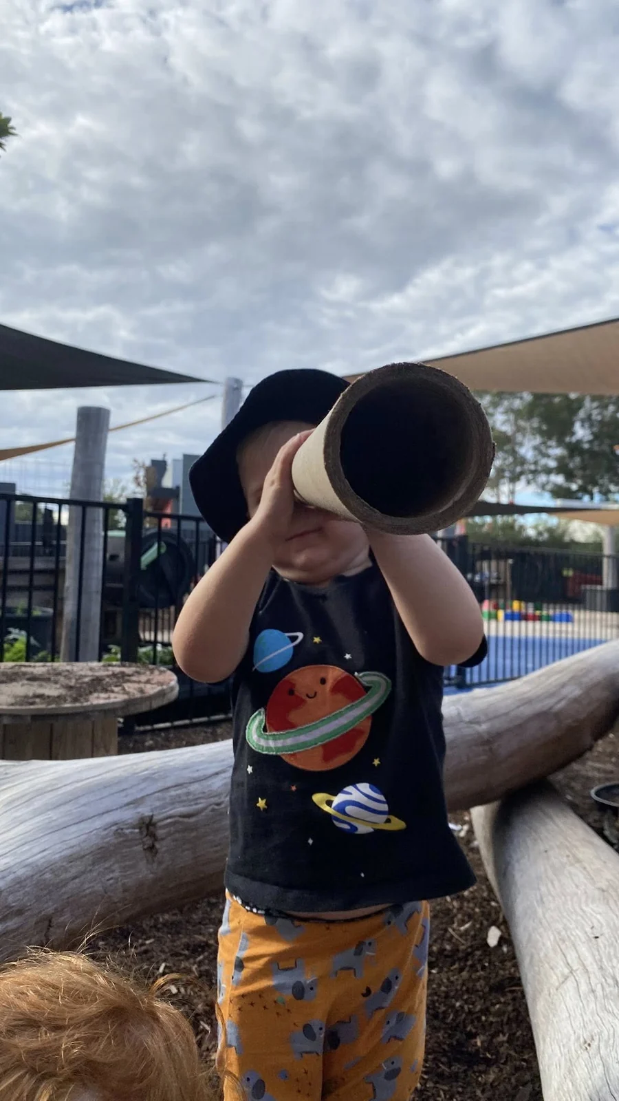 A child engaged in an early learning experience