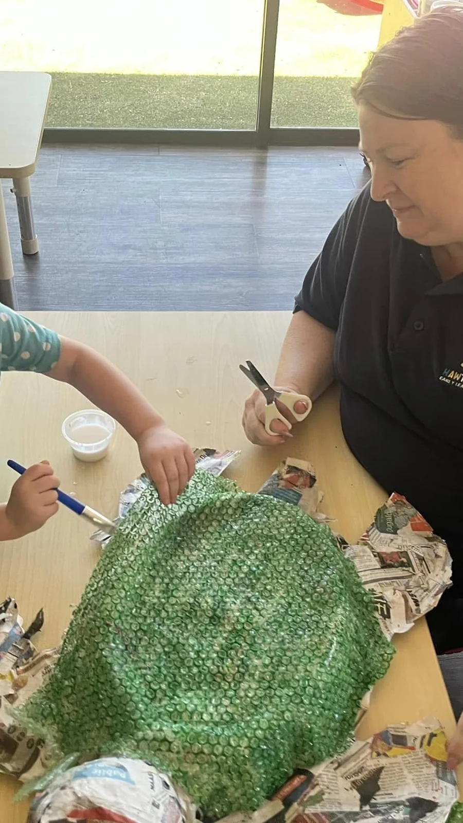 A child engaged in an early learning experience